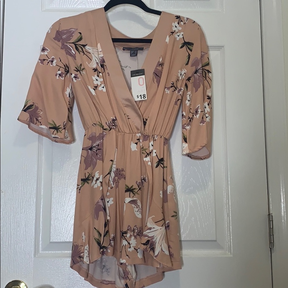 Blush colored floral Romper